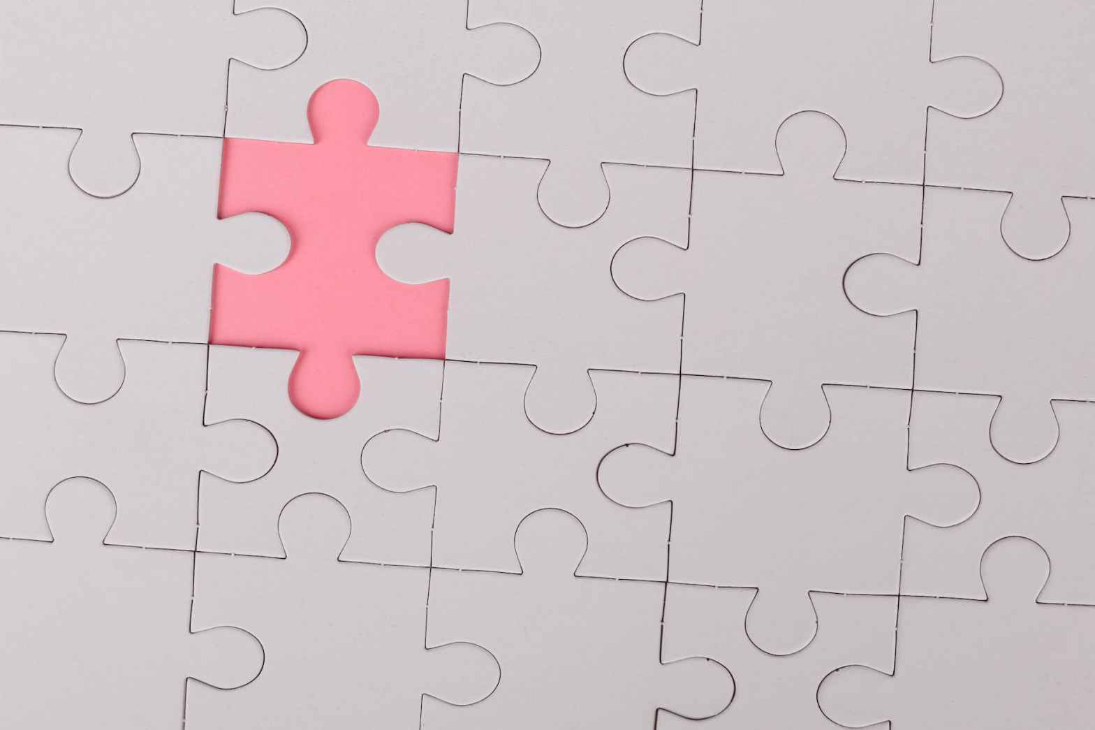 pink jigsaw puzzle piece