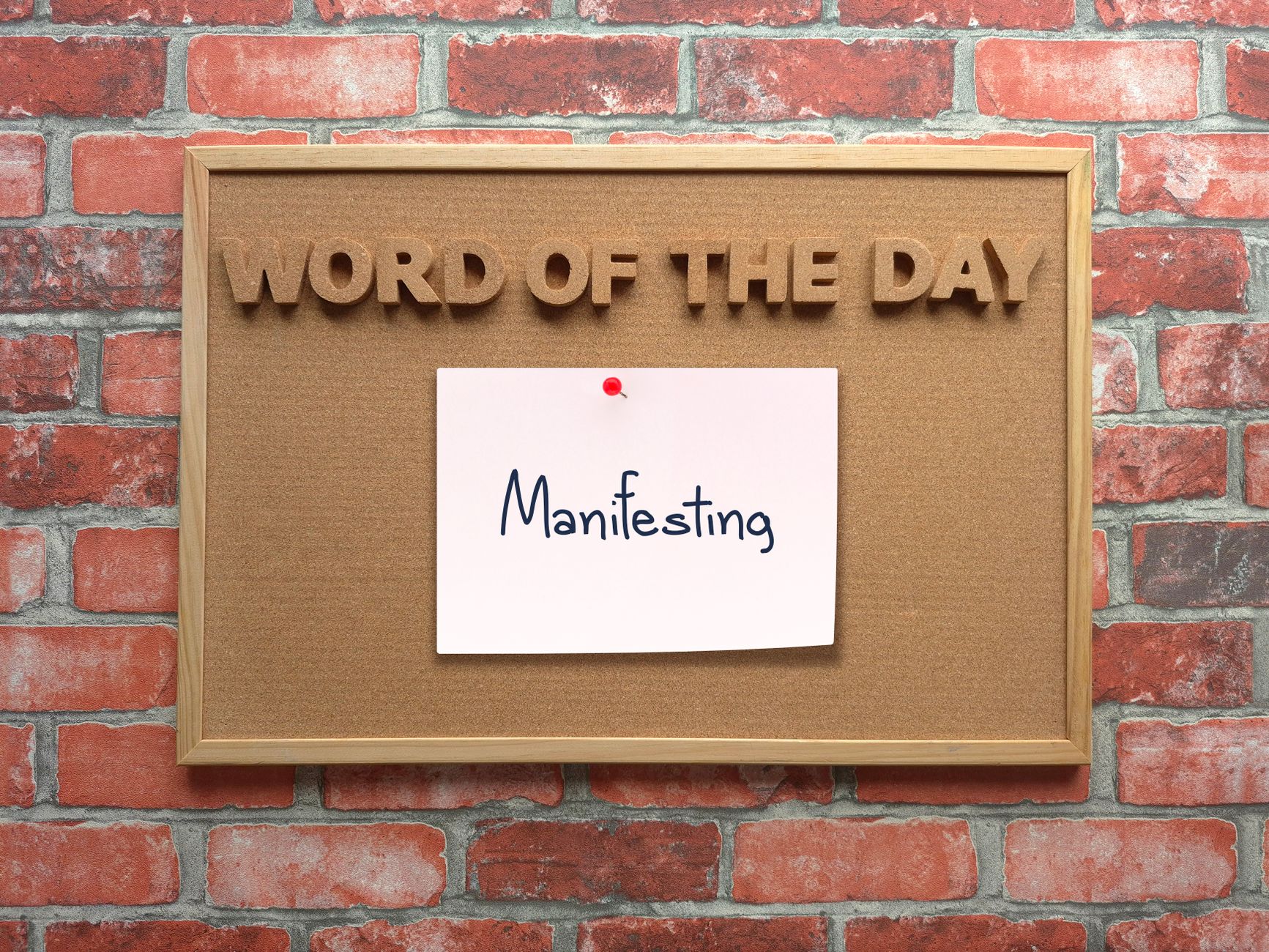 corkboard with daily word for learning